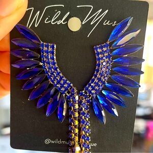 Beautiful never-worn wing style earrings. Great for any special occasion.